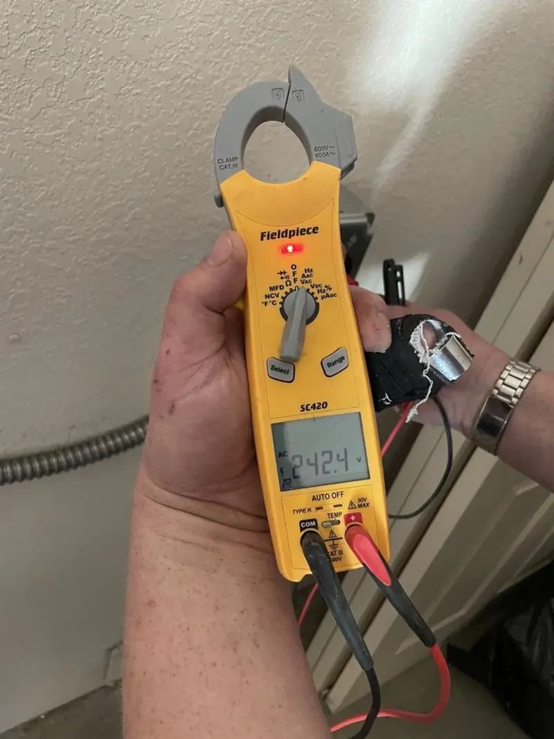 Voltage testing with clamp meter during Generator Installation in Newark